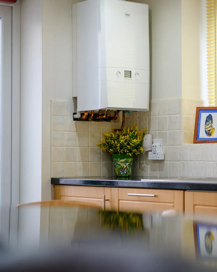 Abbey Group engineer servicing a boiler in a Whitby home