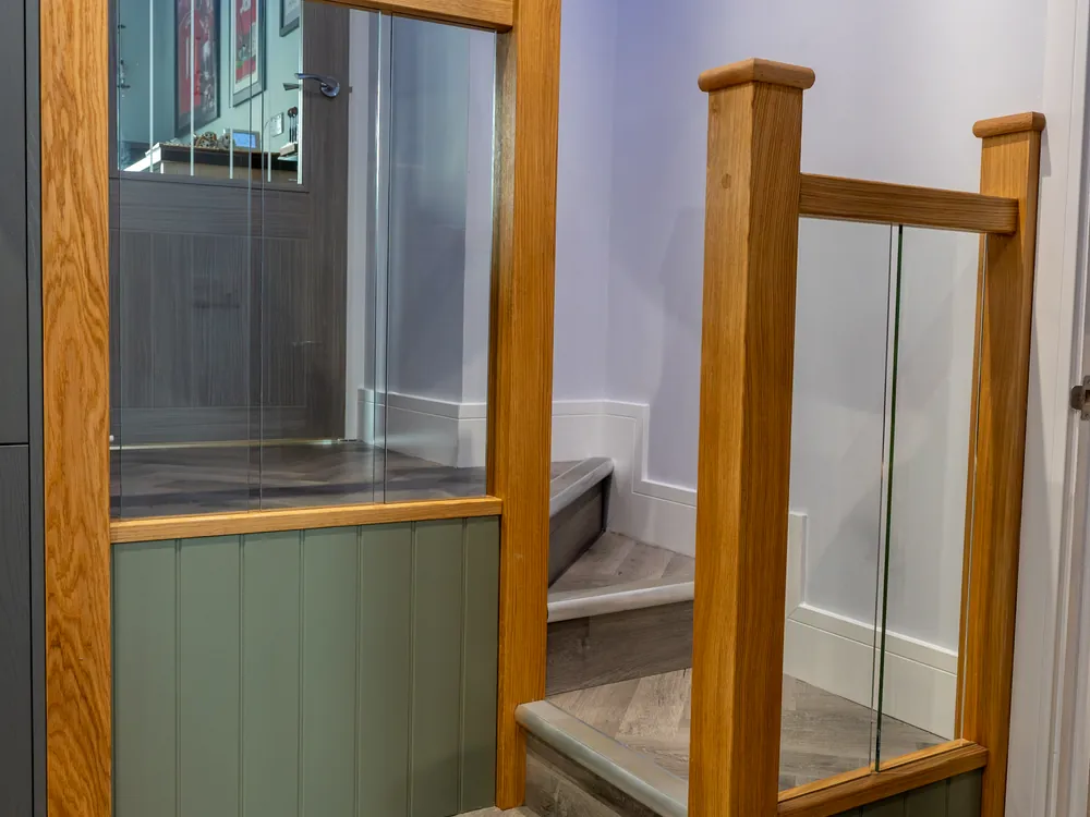 Oak and glass staircase balustrade fitted by Abbey Group in Whitby