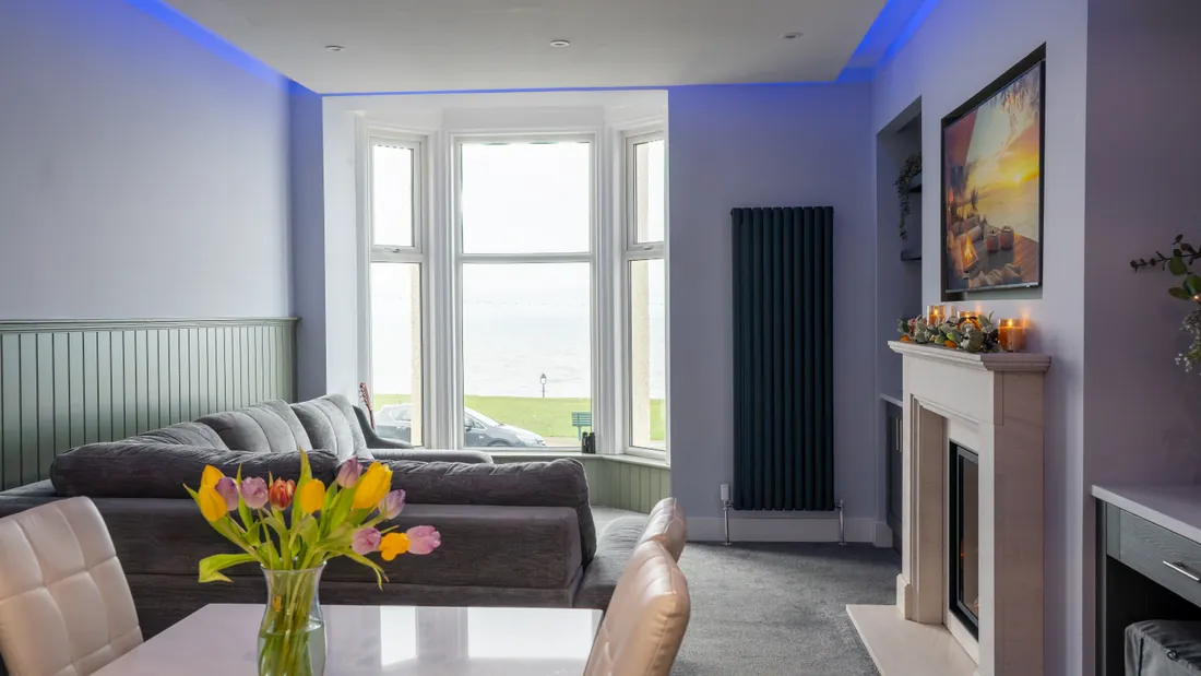 Renovated sitting room with a sea view in Whitby by Abbey Group